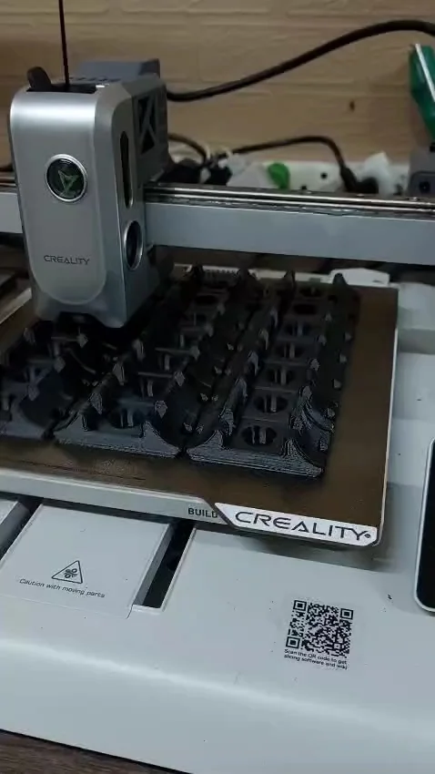 CAD 3D modelling software open on a computer screen showing a part design